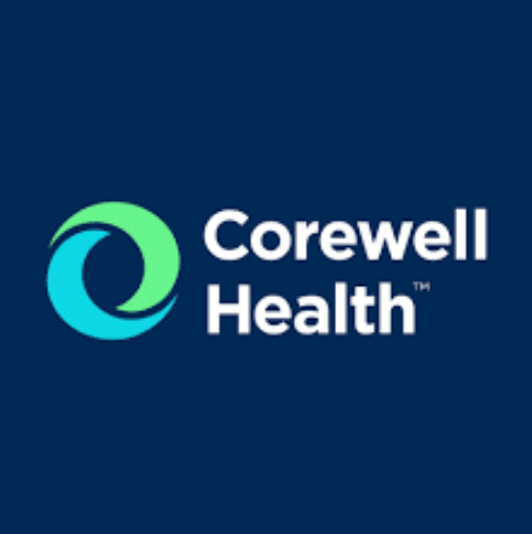 Corewell Health logo with a green and blue circular icon on a dark blue background.